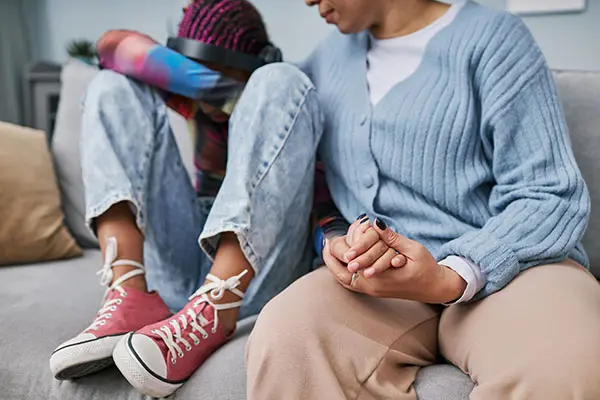 Child and parent experiencing Parental Alienation